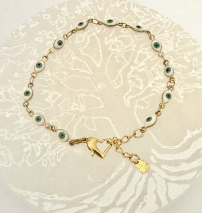 Bracelet doré œil émaillé