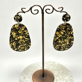 Boucles d'oreilles ovales noires dorées